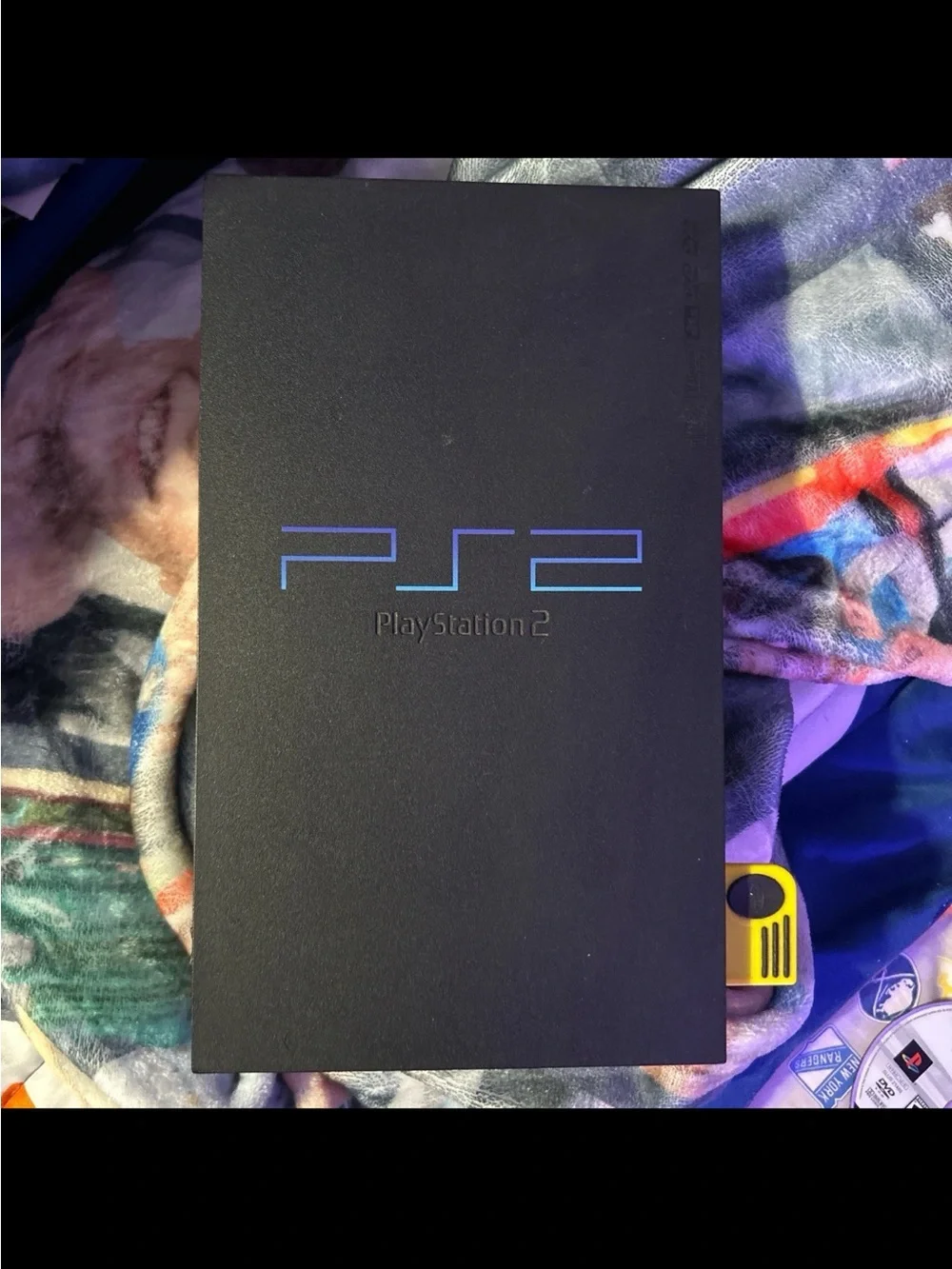 Sony PlayStation 2 Slim Bundle with Black Console and Multicolored Game Discs